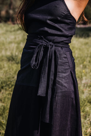 Ethically made black linen wrap long skirt with ties to adjust fit.